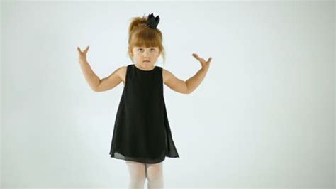 Cute Little Girl Black Dress Dancing Stock Footage Video (100% Royalty