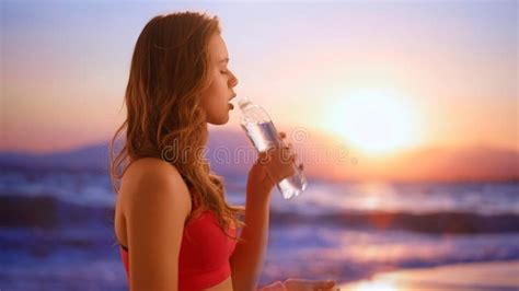 Female Model On The Beach At Sunset Young Athletic Woman In Sportswear