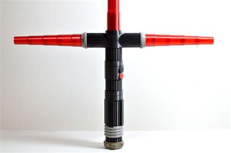 le fabshop 3D prints customizable crossguard lightsaber from star wars