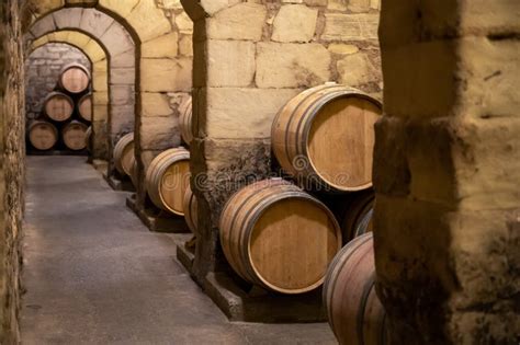 Old French Oak Wooden Barrels In Cellars For Wine Aging Process Wine