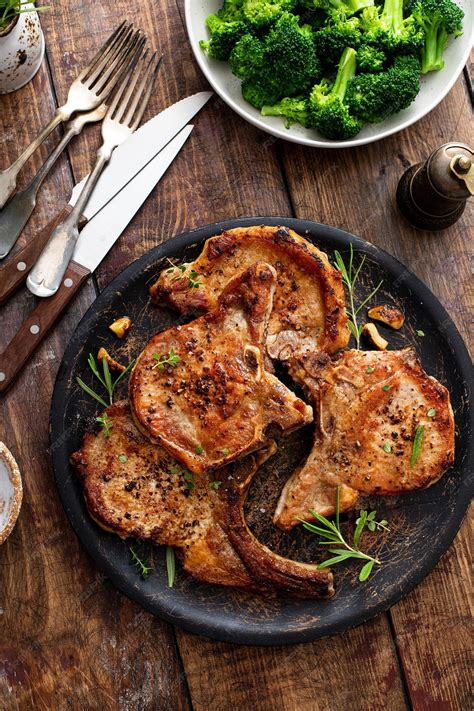 Premium Photo | Grilled or pan fried pork chops on the bone