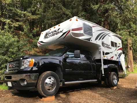 Wolf Creek 840 TruckCamper Doing Deepwoods Camping On GMC 3500