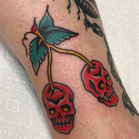 Creative Cherry Tattoo Designs Featuring Unique Fruit Imagery