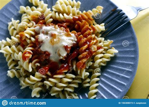 Freshly Cooked Spiral Pasta With Cheese And Tomato Sauce Stock Image