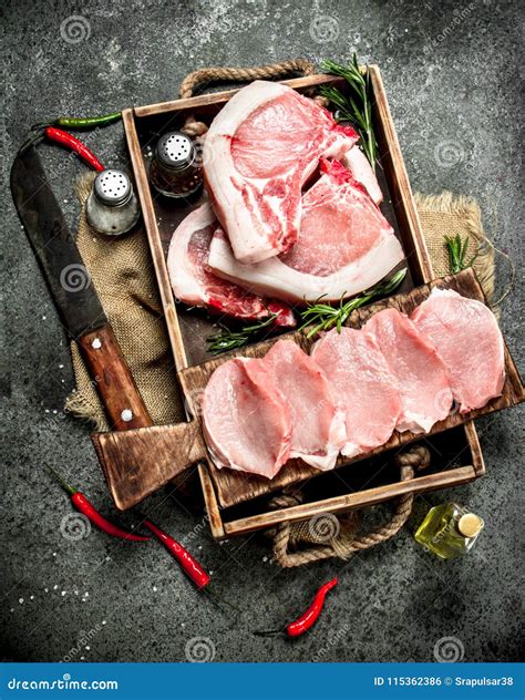 Raw Pork Meat With Herbs And Spices In A Tray Stock Photo Image Of