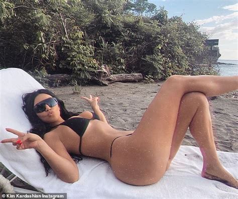 Kim Kardashian Shows Off Her Incredible Figure In A White Bikini Daily Mail Online