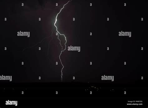 Cloud to ground lightning in night sky Stock Photo - Alamy