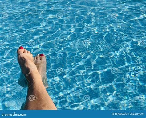 Woman S Feet In The Swimming Pool Stock Photo Image Of Attractive