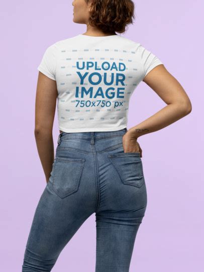 Placeit Bella Canvas Crop Top Mockup Featuring A Woman At A Studio