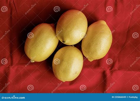 Bunch Of Lemons Close Up On Red Background Stock Image Image Of