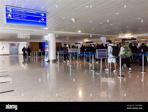 Passport control Tbilisi airport. Arrivals area at interior of Tbilisi ...