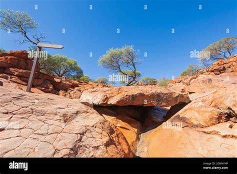 Balancing rock with Aboriginal rock paintings, Mount Augustus National ...