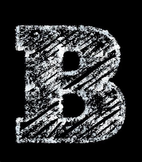 The Letter B Is Made Up Of White Paint And Has Been Drawn With Black Ink