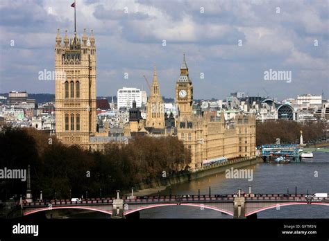 View Along The River The Houses Of Parliament In Westminster Hi Res