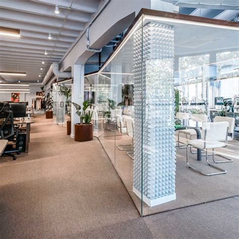 El Departamento Transforms Old Barcelona Building Into Nude Project S Headquarters