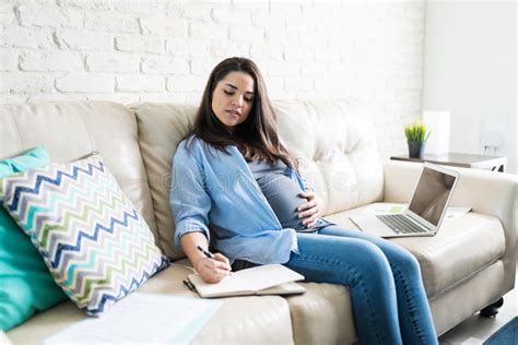 Gorgeous Expectant Mother With Naked Tummy Blowing Kiss Stock Photo Image Of Feeling Jeans