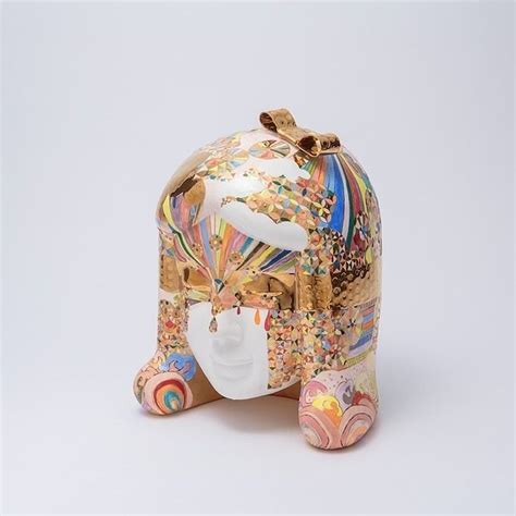 An Elephant Statue Made Out Of Glass On A White Background With Lots Of