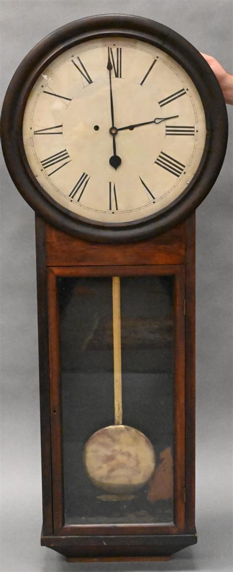 At Auction Long Drop Oak Regulator Clock