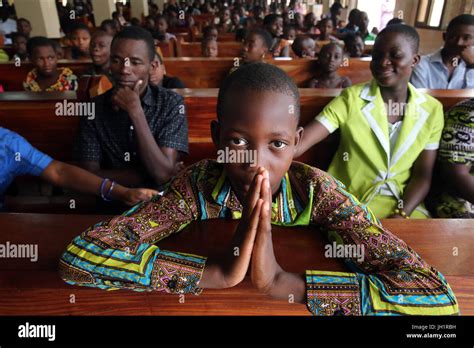 Boy Praying Catholic Church Hi Res Stock Photography And Images Alamy