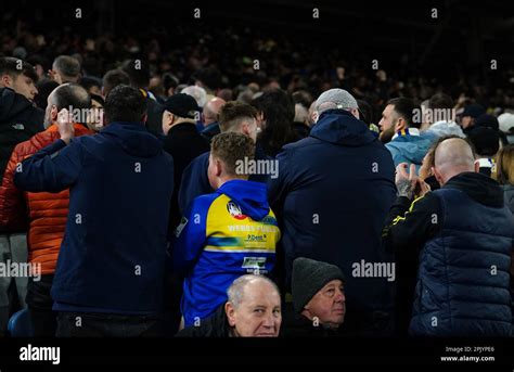 Leeds United Fans Turn Their Back On The Action During The Premier