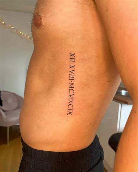 Roman Numerals Tattoo Men Ribs