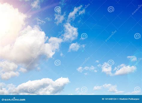 Clouds in the Blue Sky with Sun Rays Stock Photo - Image of clouds ...