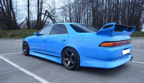 Для чего нужен спойлер на автомобиле