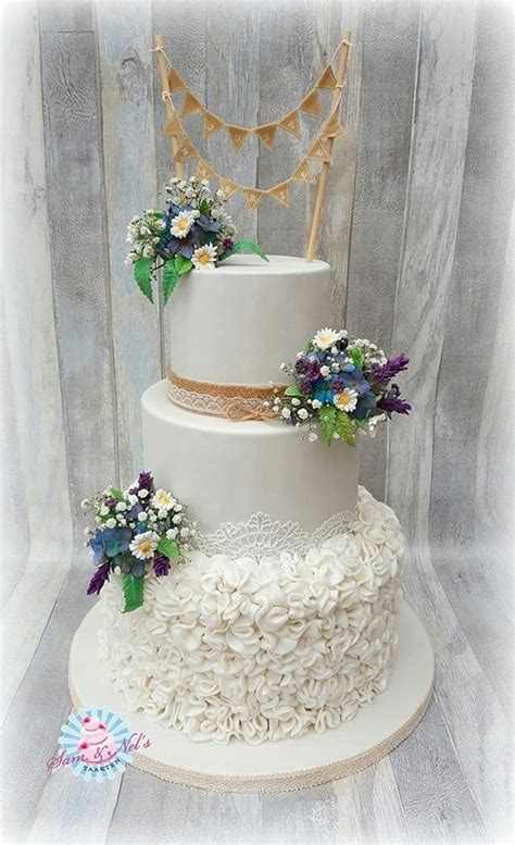 Weddingcake Wild Flowers And Ruffles Decorated Cake By Cakesdecor