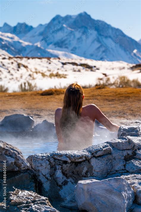 Female Soaking In Natural Hot Springs Stock Photo Adobe Stock