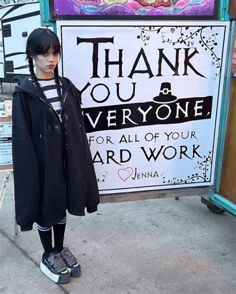 A Mannequin Is Standing In Front Of A Sign That Says Thank You Everyone