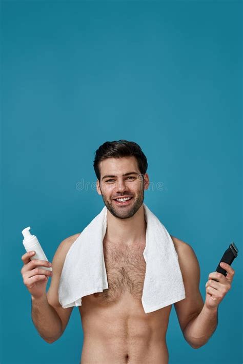 Nice Looking Naked Guy With White Towel Around His Neck Smiling At