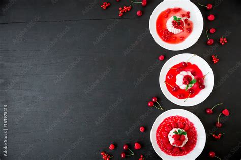 Panna Cotta With Fruit Syrup In A Plate On A Dark Background And Tasty