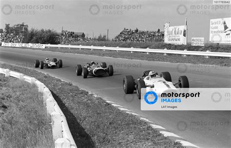 John Surtees Honda RA300 Leads Jo Siffert Cooper T81 Maserati And