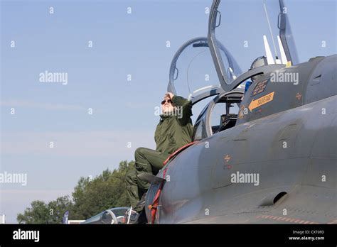 The pilot of the aircraft Dassault Mirage 2000N sits near the cockpit ...