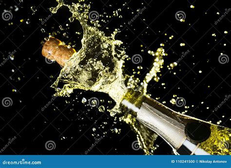 Close Up Image Of Champagne Cork Flying Out Of Champagne Bottle