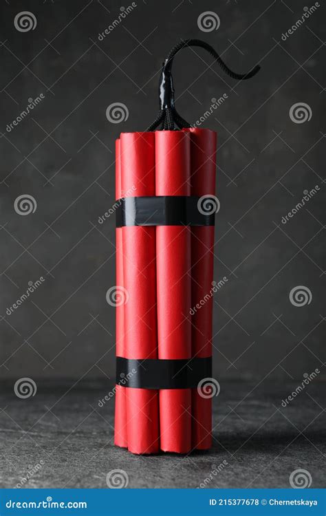 Red Explosive Dynamite Bomb on Grey Table Stock Photo - Image of fuse ...