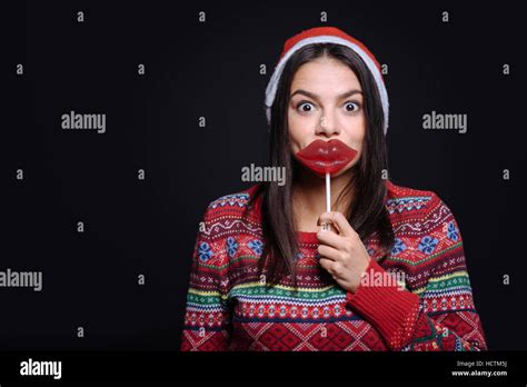 Funny girl playing with the lollipop Stock Photo - Alamy