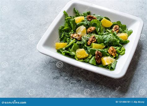 Salad with Rocket Leaves, Orange and Walnuts / Arugula or Rucola. Stock ...