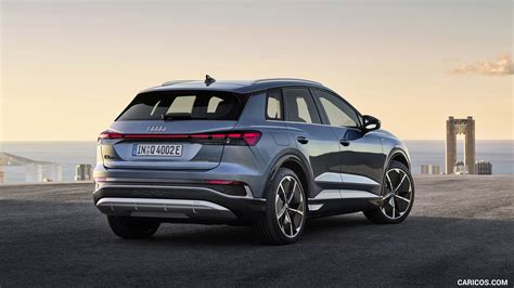 Audi Q4 e-tron | 2022MY (Color: Geyser Blue Metallic) | Rear Three-Quarter