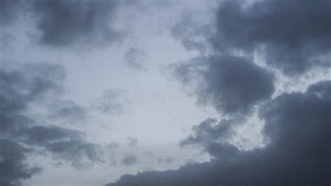 Dark Blue Rain Clouds in the Dark Blue Sky at Blue Hour. Stock Image ...