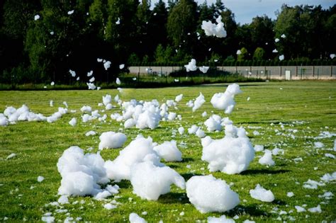Premium Photo | Foam on the grass at the foam party