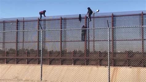 Video Shows Migrants Jumping Border Fence Youtube