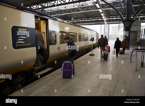 Passengers boarding a Eurostar train at Brussels Midi station Stock ...