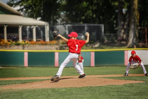 Young pitcher on the mound in a youth baseball game - South Island