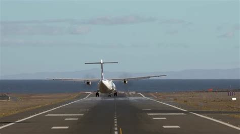 Jetliner Landing on Runway By the Sea, Stock Footage | VideoHive