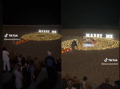 A Tiktok Shows Couple In Beach Proposal Looking For The Ring Business Insider