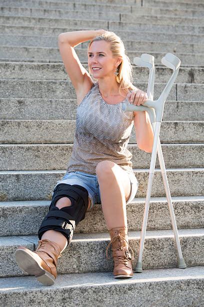 Young Woman With Crutches Stock Photos Pictures And Royalty Free Images