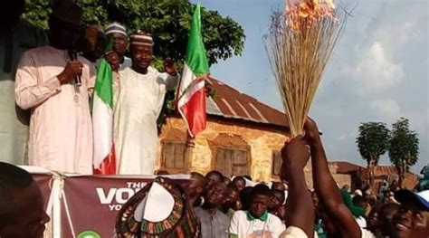 Hundreds Of APC Members In Nasarawa Defect To PDP Burn Brooms Photo