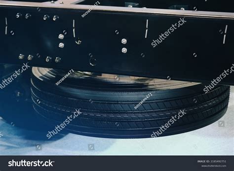 how to get spare tire from under truck
