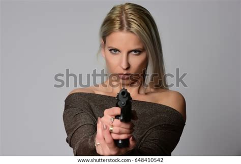 Beautiful Dangerous Women Holding Gun Isolated Stock Photo